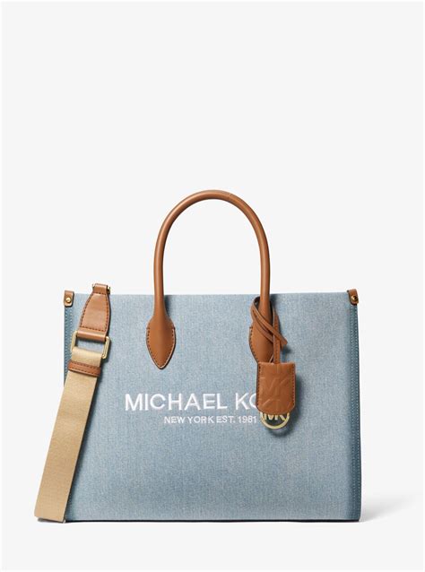 michael kors denim cosmetic bag|mirella medium denim tote bag.